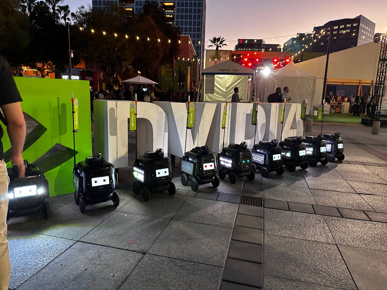 Autonomous delivery robots lined up at NVIDIA GTC 2026